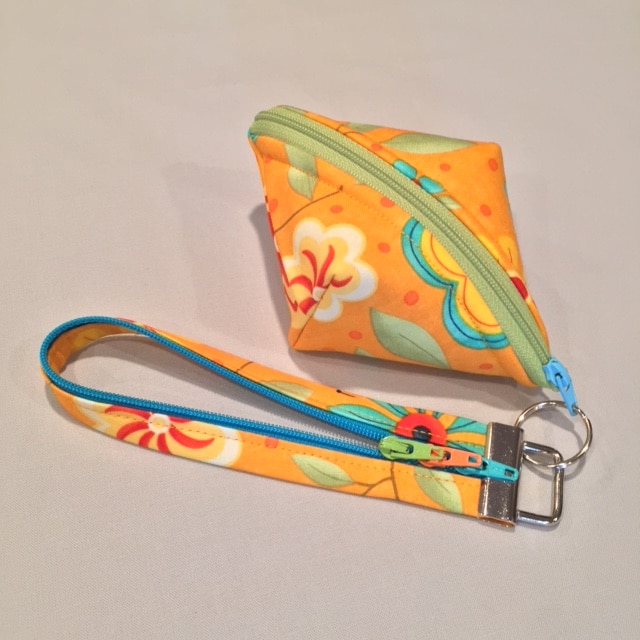 DIY wristlet of Sweetpea Pods zippered pouch and Fobio key fob in #ModaFabric #LazyGirlDesigns