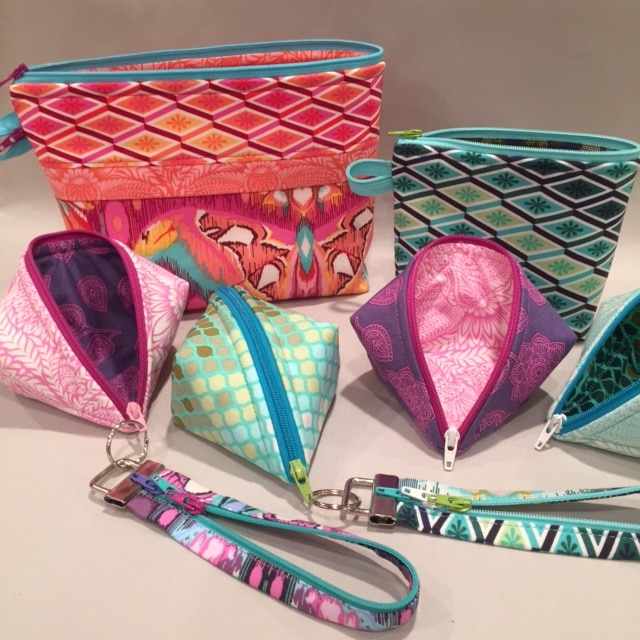 Small zipper pouches and more in gorgeous #TulaPink fabrics. Sweetpea Pods, Becca Bags, and Fobio key fobs by #LazyGirlDesigns