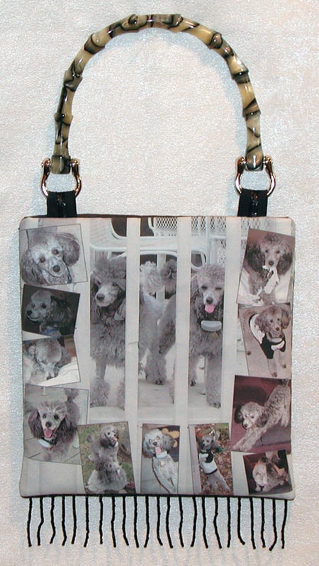 Handbag with many pictures of dogs.