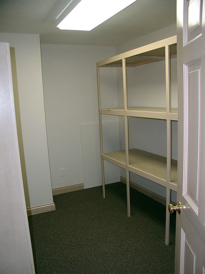 Storage closet with built-in shelving.