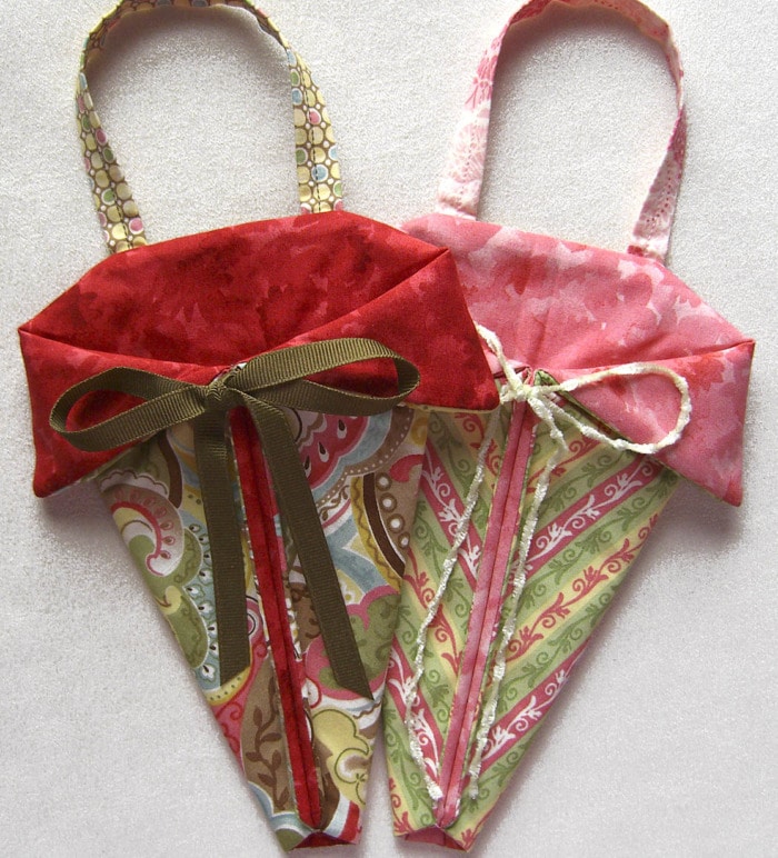 Triangular pouch filled with loves notes for Valentine's Day gifts.