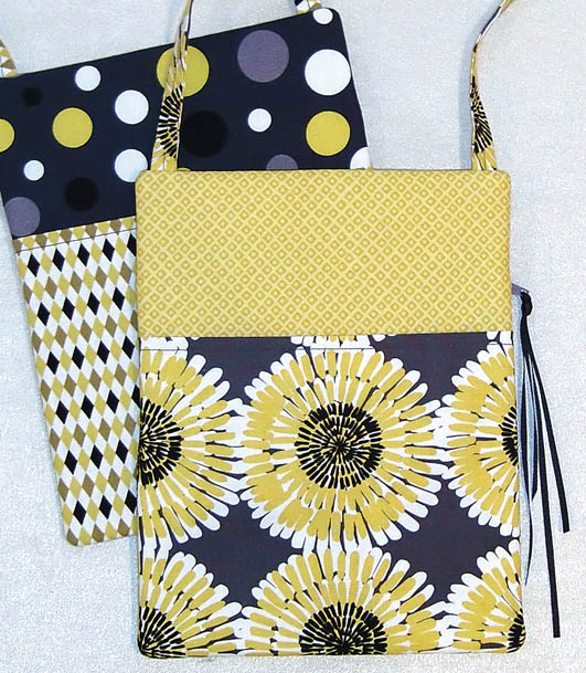 View of back pocket on two small purses.