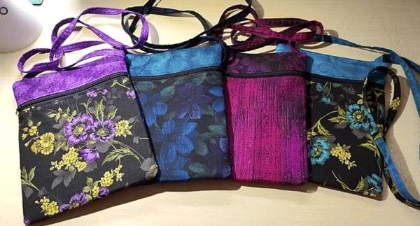 Four small zipper bags in a variety of colors.