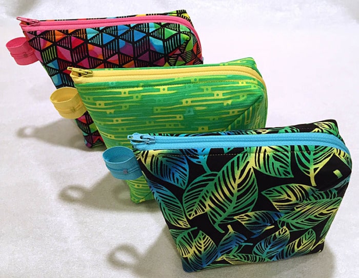 Three small zipper pouches.