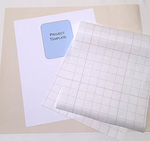 supplies to add iron on vinyl to a paper template