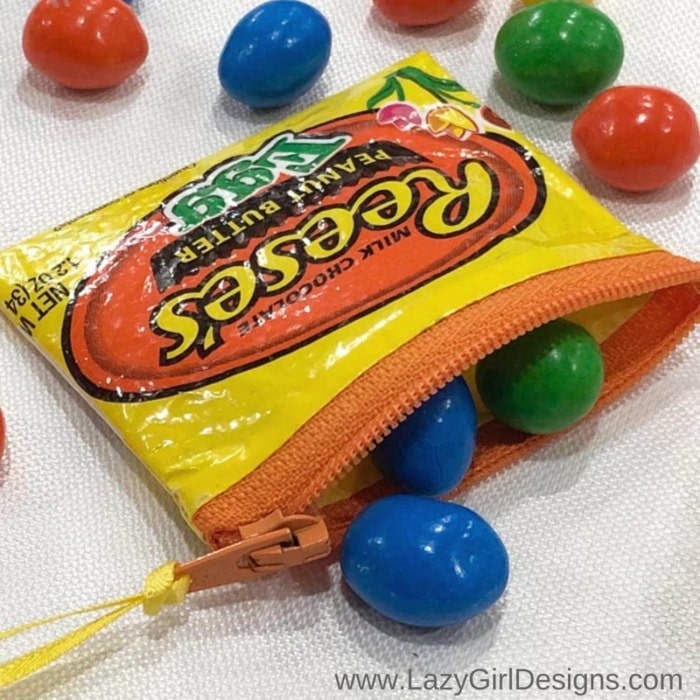 Candy wrapper zipper pouch with candy.