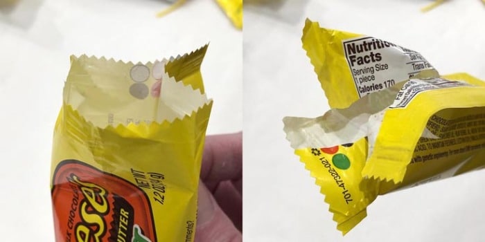 Close up of the opened end of a candy wrapper.