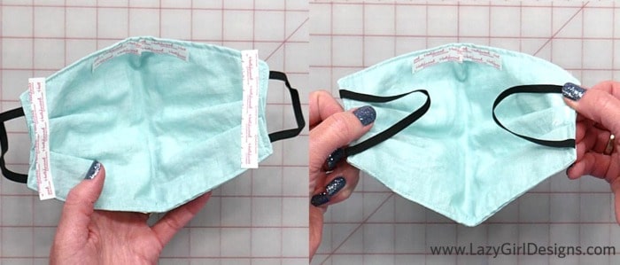 Fabric face mask with elastic ear loops tucked inside.